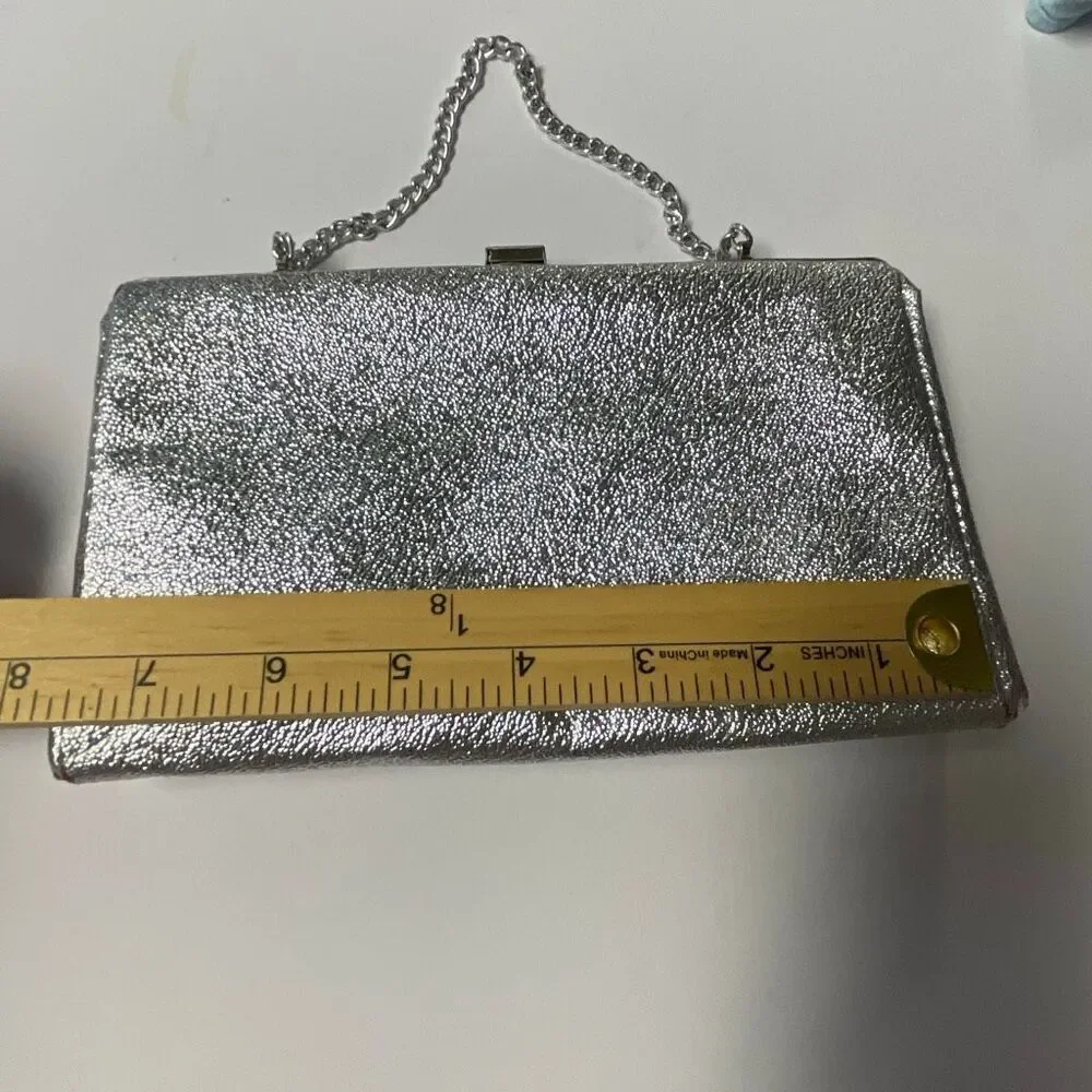 Vintage silver clutch with chain handle. Silver metallic
